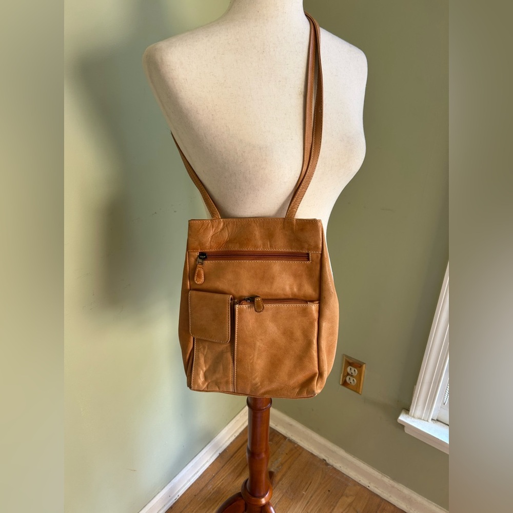 Chaos All Leather crossbody  bag. Medium tan. Lots of pockets! Distressed look.